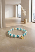 Bracciale Elastico in Acquamarina Naturale con Ciondolo Fiore di Loto 24K - 6mm