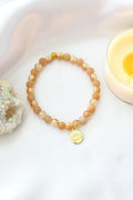 Bracciale Elastico in Pietra del Sole con Ciondolo Fiore di Loto 24K